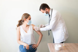 women getting covid vaccine